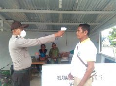 Bhabinkamtibmas Desa Arui Das Turun Langsung Mengecek Suhu Tubuh Warganya