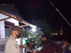 Bhabinkamtibmas Desa Olilit Barat Jaga Ketat Setiap Warga Yang Keluar Masuk Desa