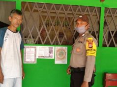 Bhabinkamtibmas Desa Sifnana Tempelkan Himbauan Pencegahan Covid 19