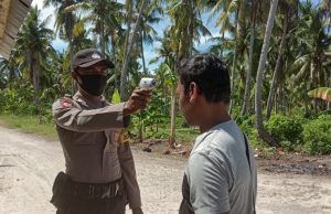 BHABINKAMTIBMAS FURSUY AJAK WARGA DISIPLIN PATUHI PROTOKOL KESEHATAN PENCEGAHAN VIRUS COVID – 19