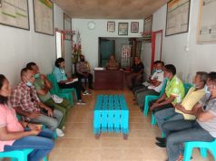 Bhabinkamtibmas Lorulun hadiri Rapat Evaluasi bersama Tim relawan Covid-19 Desa Lorulun.