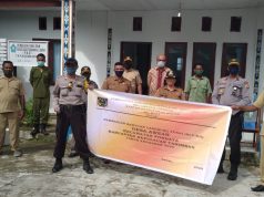 Bhabinkamtibmas Desa Awear Lama Kawal Sekaligus Pam Pembagian BLT