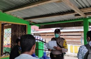 Covid 19 Menjadi Materi Sosialisasi Bhabinkamtibmas Desa Olilit Barat Bagi Warganya