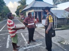 Bhabinkamtibmas Desa Sangliat Dol,Ajak Warga Untuk Patuhi Protokol Kesehatan Penanganan Covid 19