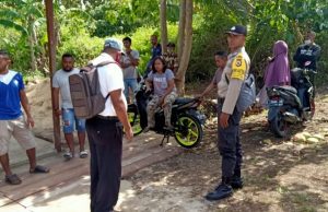 Cegah Tindak Pidana, Bhabinkamtibmas Lauran bersama Staf Desa hentikan sementara aktivitas di lahan Sengketa