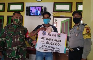 Bhabinkamtibmas dan Babinsa Sifnana amankan Giat Penyaluran BLT