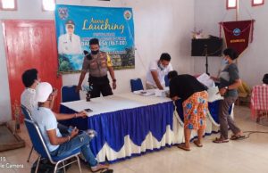 Bhabinkamtibmas Welutu amankan giat Pembagian BLT