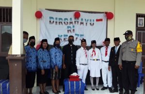 Bhabinkamtibmas Desa persiapan Ilngei Barat Ikuti Upacara Pengibaran Bendera Merah Putih Peringati HUT RI ke-75 Tahun 2020