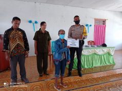 Bhabinkamtibmas Romean Amankan Pembagian Bantuan Langsung Tunai Dana Desa (BLT-DD) Tahap III