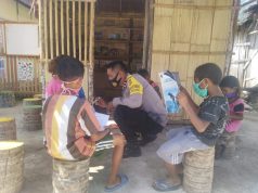 Bhabinkamtibmas Amdasa Laksanakan Program Belajar Anak Dalam Program Membaca Anak Melalui Perpustakaan Bhabinkamtibmas