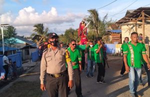 Bhabinkamtibmas Sifnana Amankan Perarakan Kristus Raja
