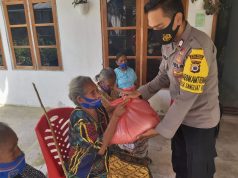 Bhabinkamtibmas Sangliat Dol Amankan Giat Pembagian Bantuan Sembako Yayasan Budha Tsu Chi Indonesia